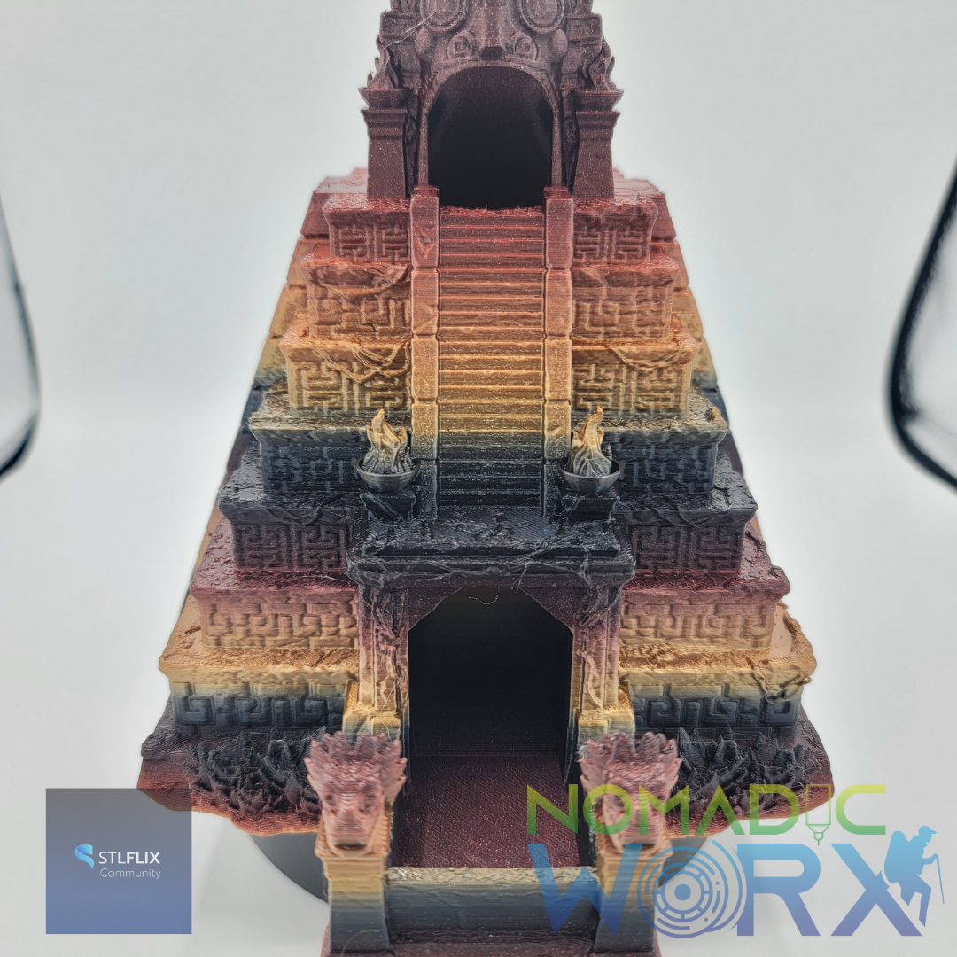 3D printed ancient temple dice tower with gradient filament, carved stone reliefs, guardian statues, and tiered staircase by NomadicWorx